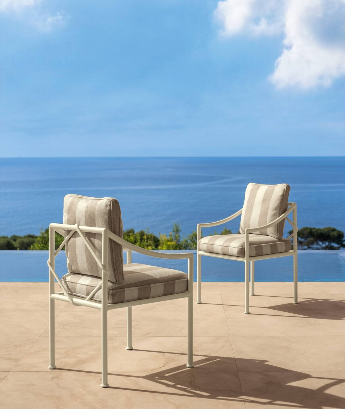 Capri Sofa 2 Seater by Talenti, offering a contemporary outdoor seating solution with a neutral-toned design to fit any modern decor.