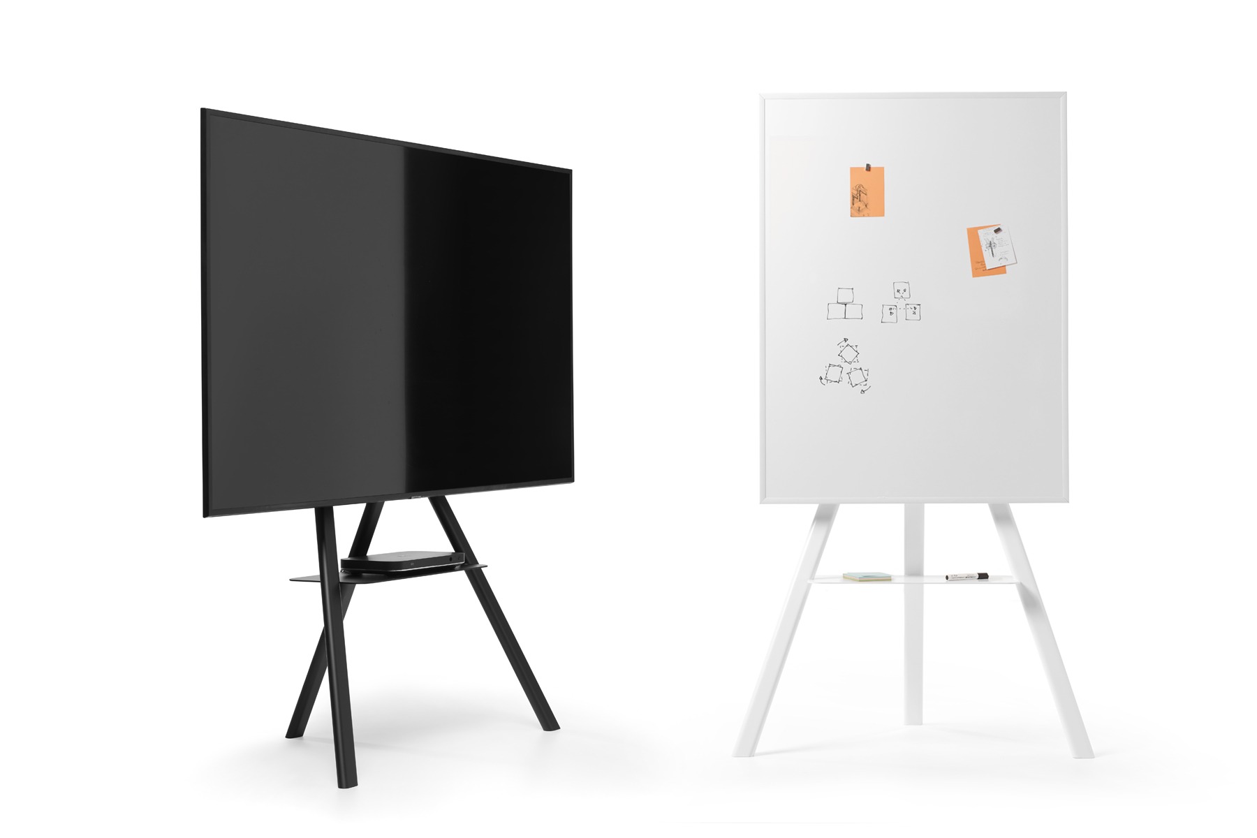 Descartes TV stand by Opinion Ciatti in matte black steel, featuring a minimalist design with integrated cable management and an open shelf, displayed in Royal Oak, Michigan showroom.