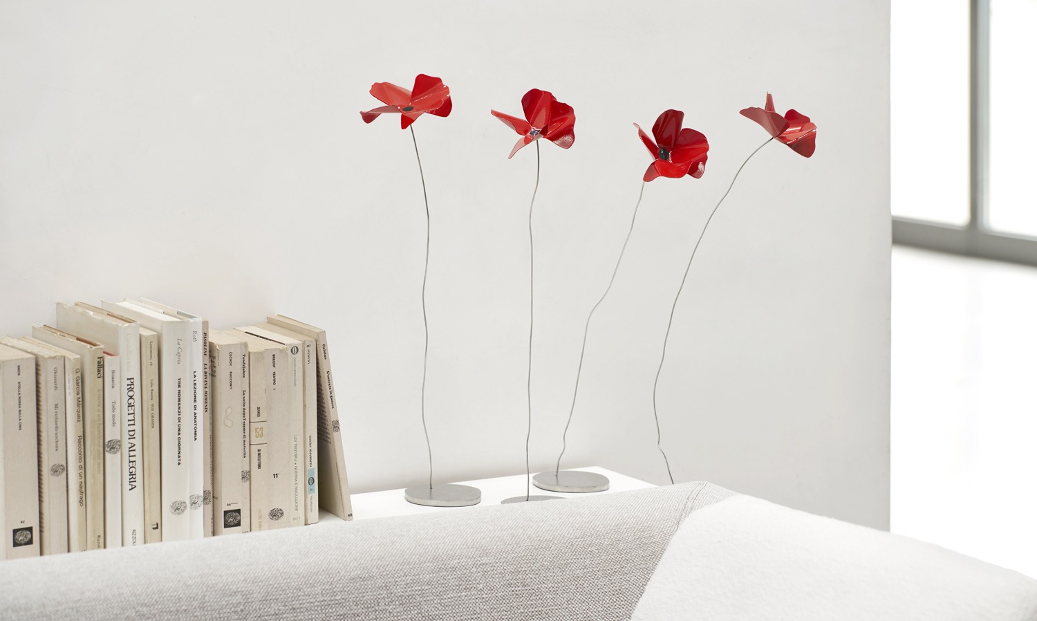 Papavero Delicato sculpture by Opinion Ciatti in red RAL 3020 lacquered steel, handcrafted in Italy, displayed in Royal Oak, Michigan.