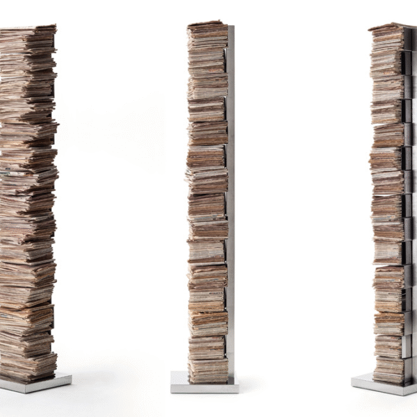 Ptolomeo Art vertical bookcase by Opinion Ciatti in matte black steel, featuring extra-large shelves for oversized books and magazines, displayed in Royal Oak, Michigan showroom.