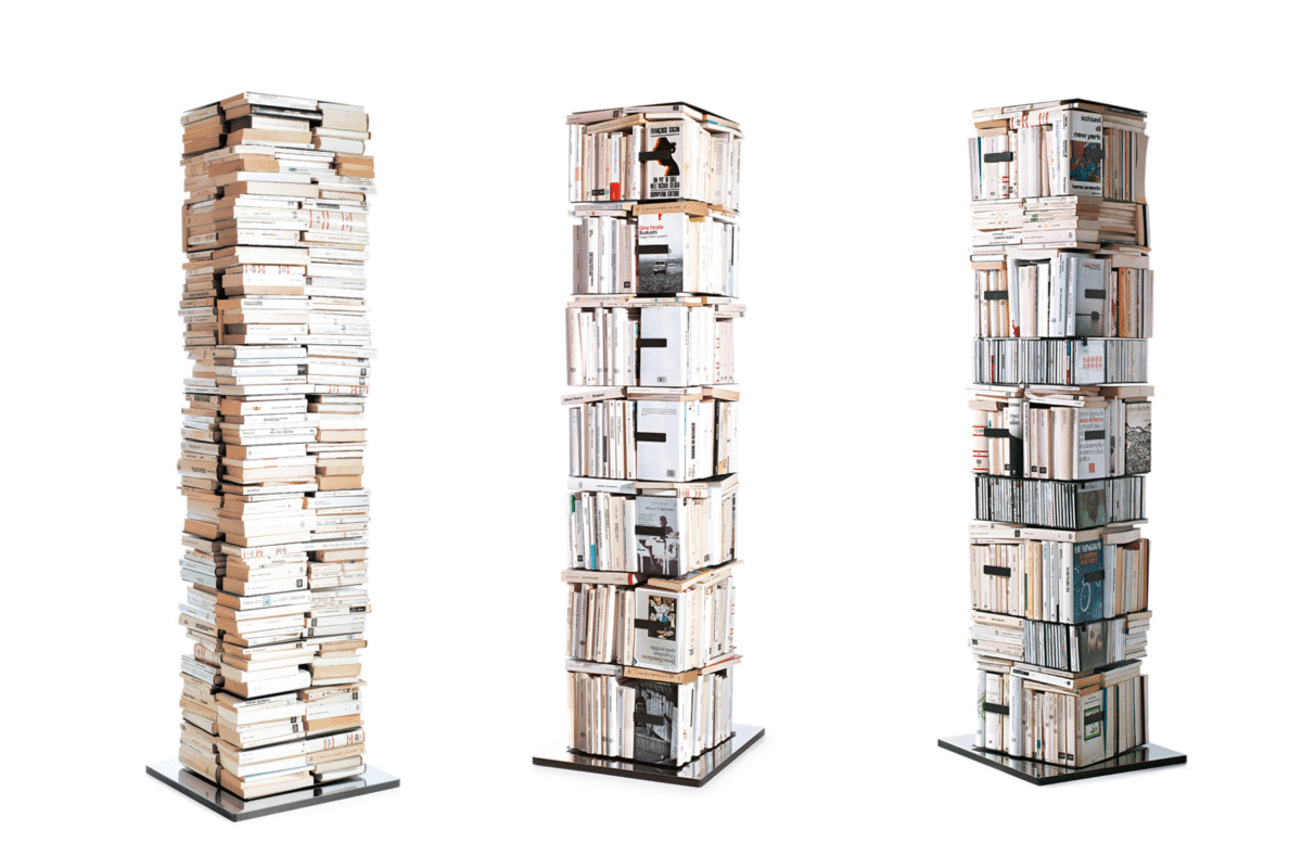 Ptolomeo X4 vertical bookcase by Opinion Ciatti in glossy white finish, featuring 14 square shelves arranged around a central column, displayed in Royal Oak, Michigan showroom.