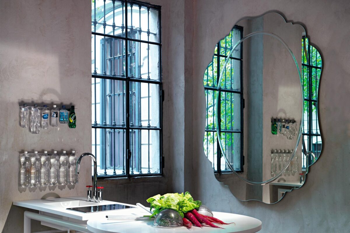Bring refined elegance to your Birmingham, Michigan space with the Regio Mirror by Opinion Ciatti, featuring a shape-cut mirror with detailed engraving, perfect for sophisticated settings.