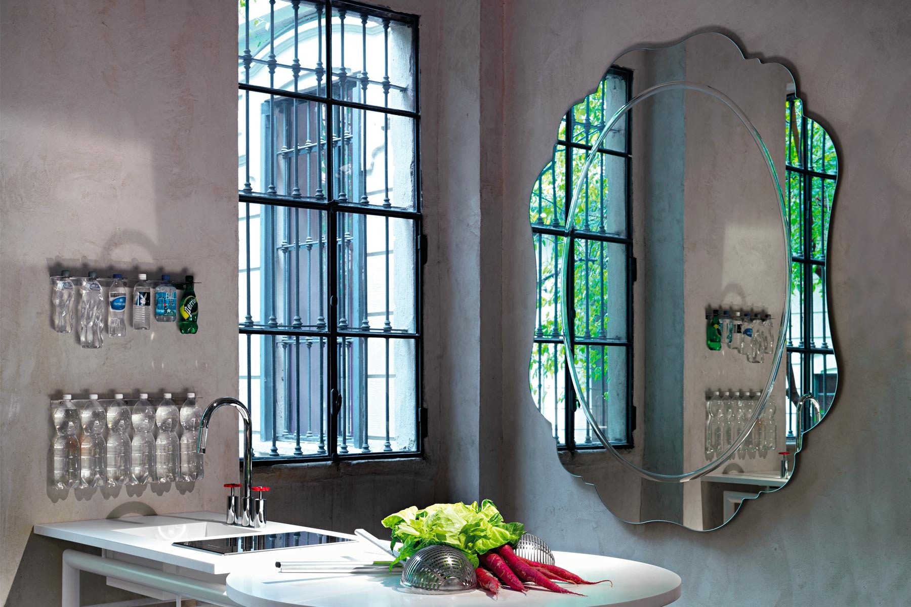 Bring refined elegance to your Birmingham, Michigan space with the Regio Mirror by Opinion Ciatti, featuring a shape-cut mirror with detailed engraving, perfect for sophisticated settings.