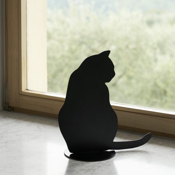 Ombres de Chats #4 steel sculpture by Angelo Barcella in black RAL 9005 finish, serving as a bookend, displayed in Royal Oak, Michigan.