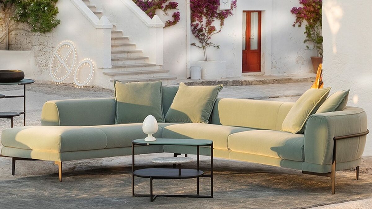 Oblò modular sofa by Natuzzi Italia, designed by Maurizio Manzoni, featuring a sleek metal frame and plush cushions, showcased in Royal Oak, Michigan showroom.