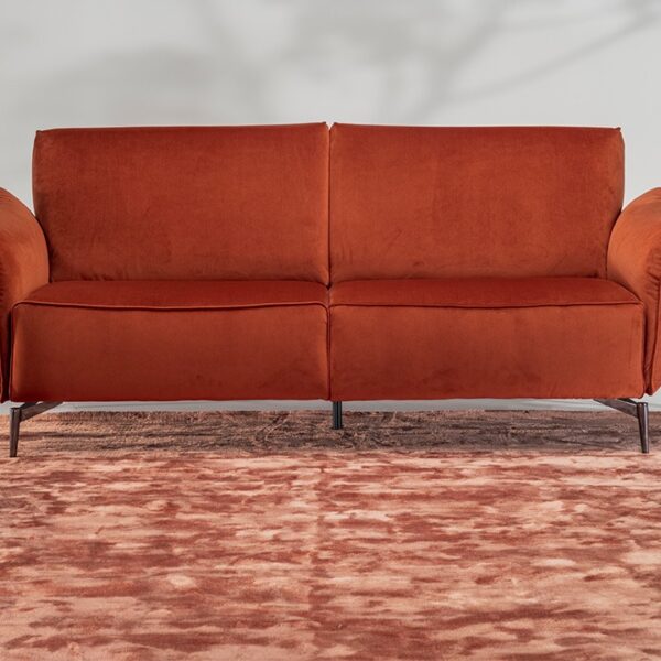 Milano sofa by Natuzzi Italia in dark brown leather with padded armrests and black chrome metal feet, displayed in Royal Oak, Michigan.