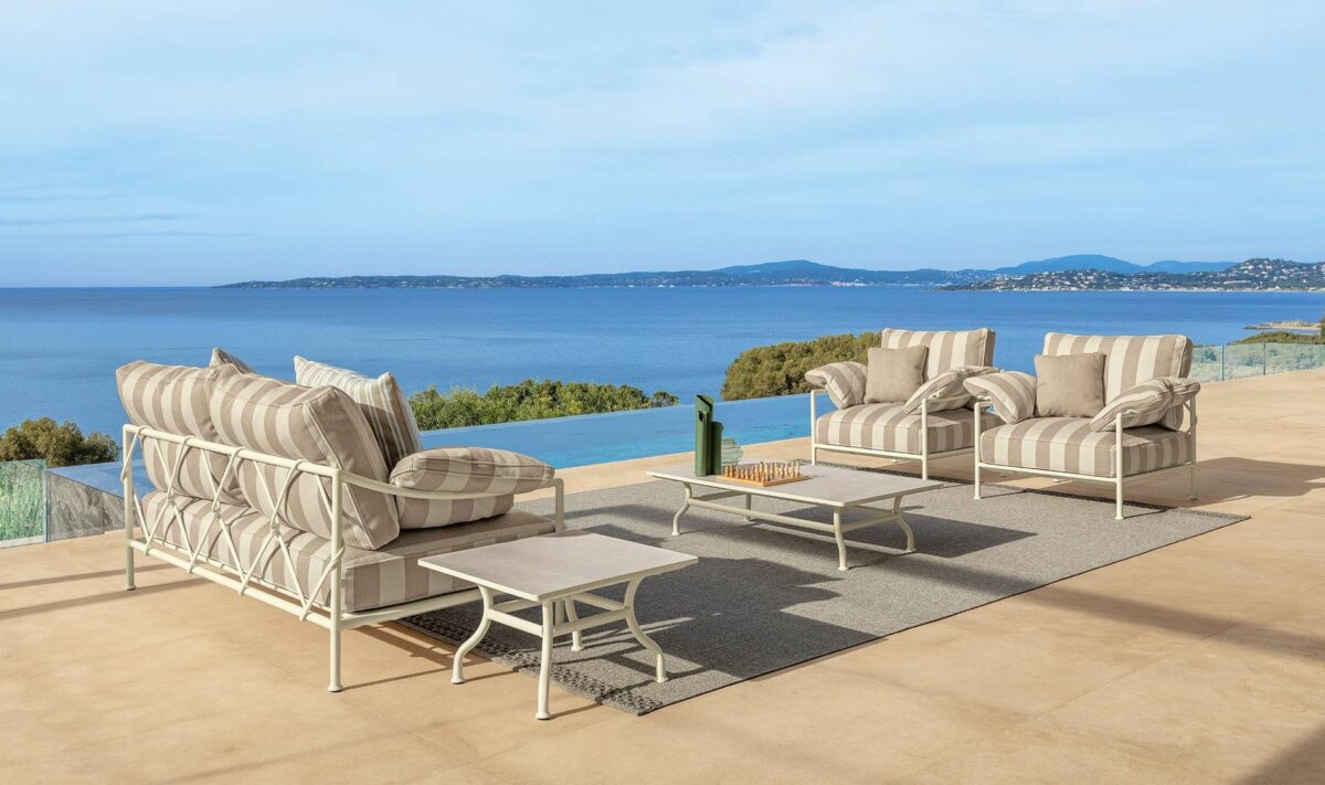 Capri Sofa 2 Seater by Talenti, offering a modern design with soft cushions and a durable aluminum structure for outdoor comfort.