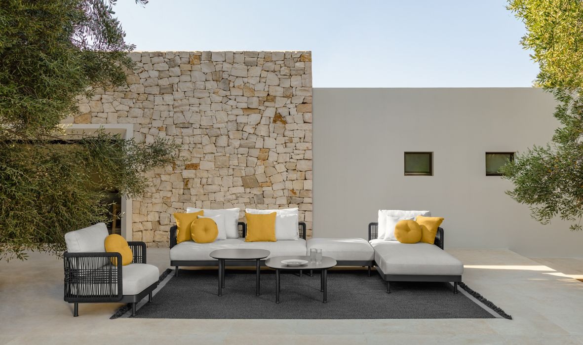 Slam//Rope Sofa by Talenti, featuring a sleek aluminum frame with a woven synthetic rope backrest for a contemporary outdoor seating option.
