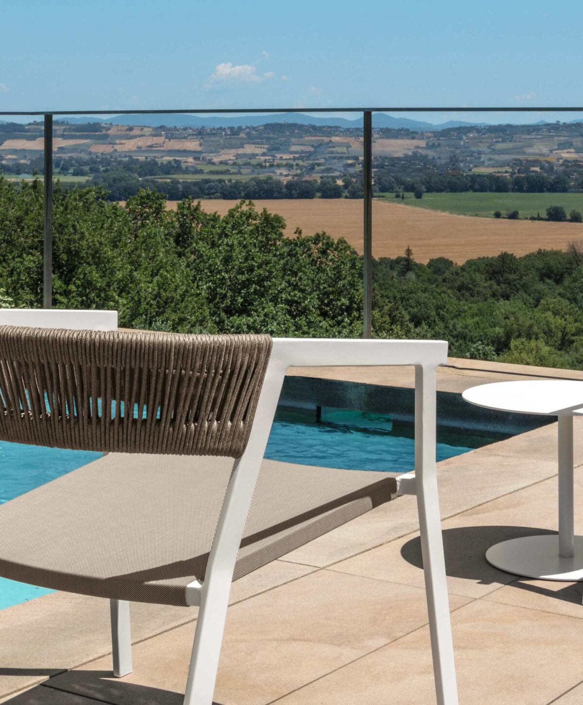Elegant Talenti Key Armchair, designed for modern garden spaces in Birmingham, Michigan