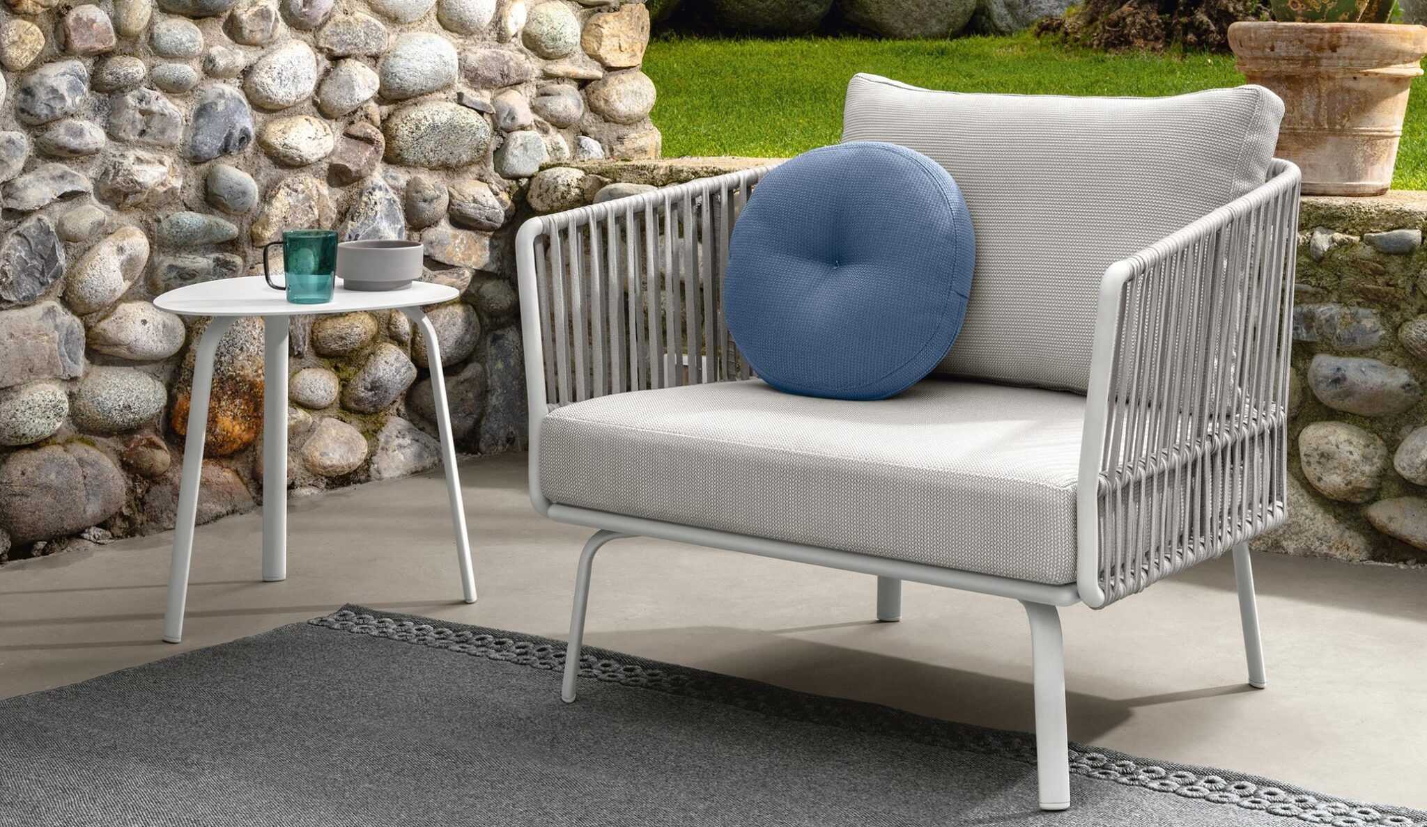 Milo Living Armchair by Talenti – sleek Italian outdoor lounge chair with aluminum frame and padded cushions