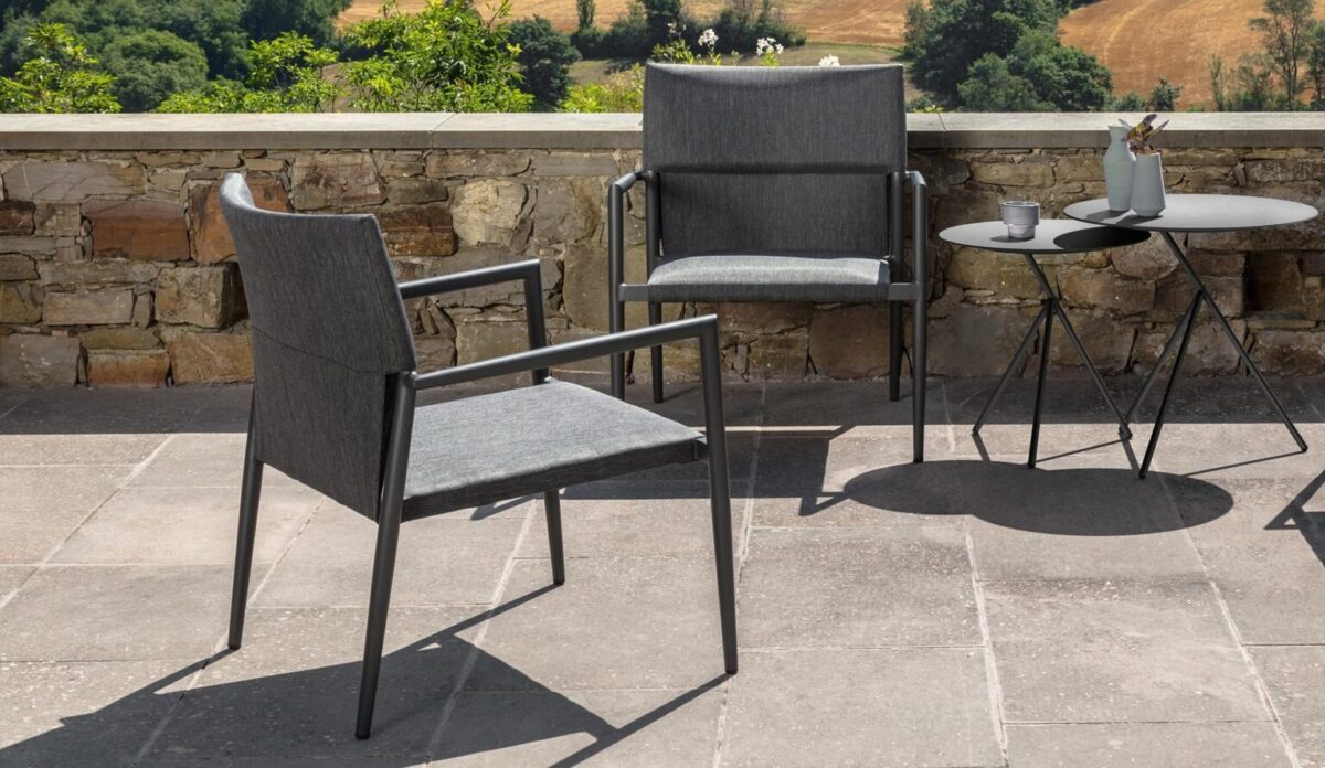 Contemporary Adam living armchair with structured silhouette by Talentispa