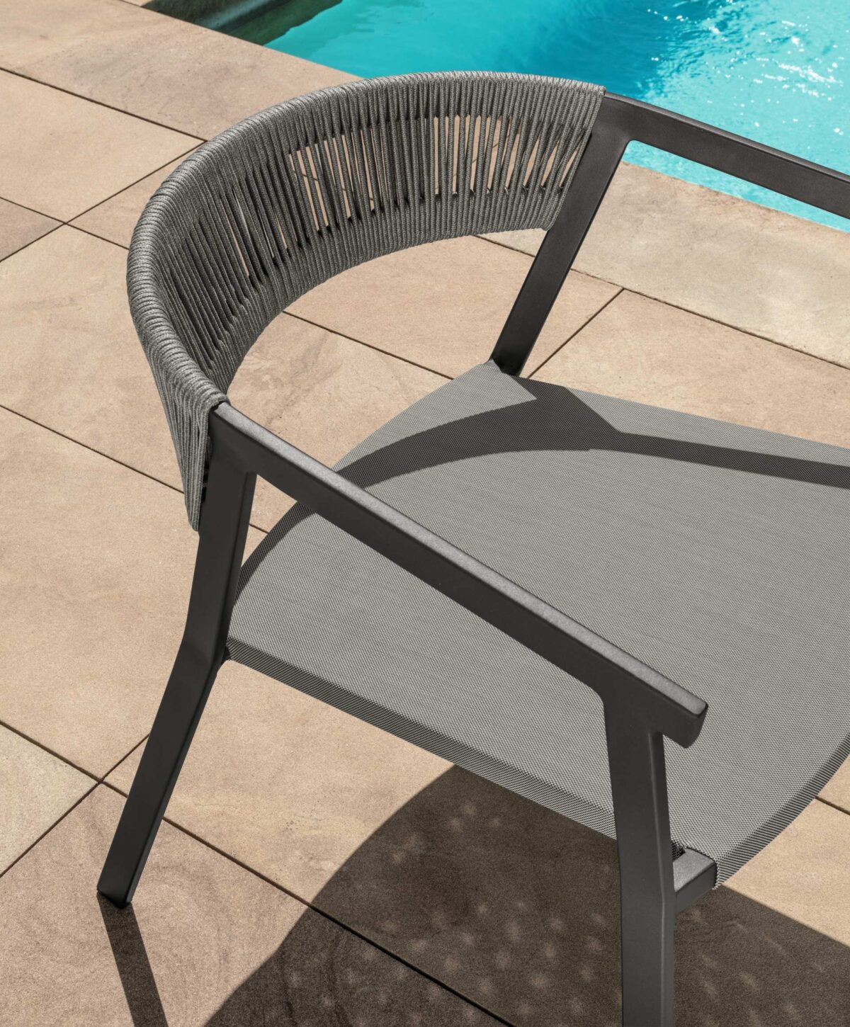 High-end Key Living Armchair by Talenti offering comfort and durability for sophisticated outdoor spaces