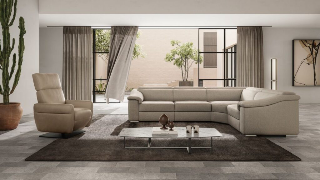 Brick sofa by Natuzzi Italia with leather upholstery and reclining headrests, displayed in Royal Oak, Michigan.