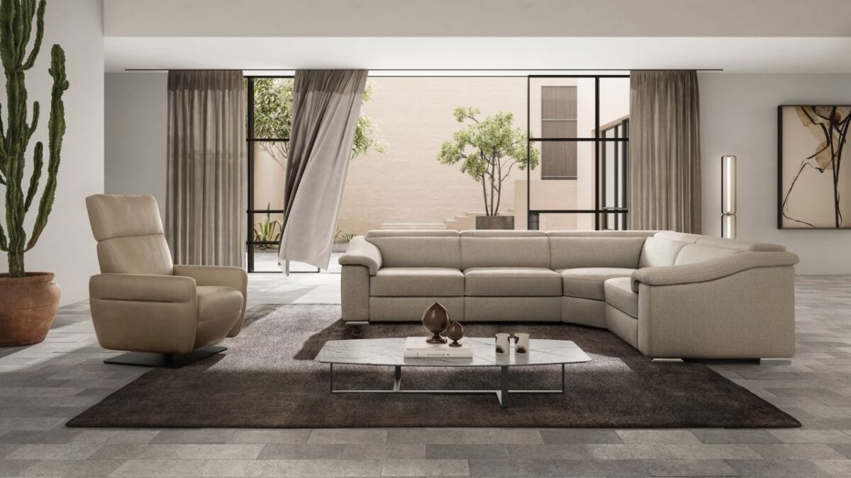 Brick sofa by Natuzzi Italia with leather upholstery and reclining headrests, displayed in Royal Oak, Michigan.