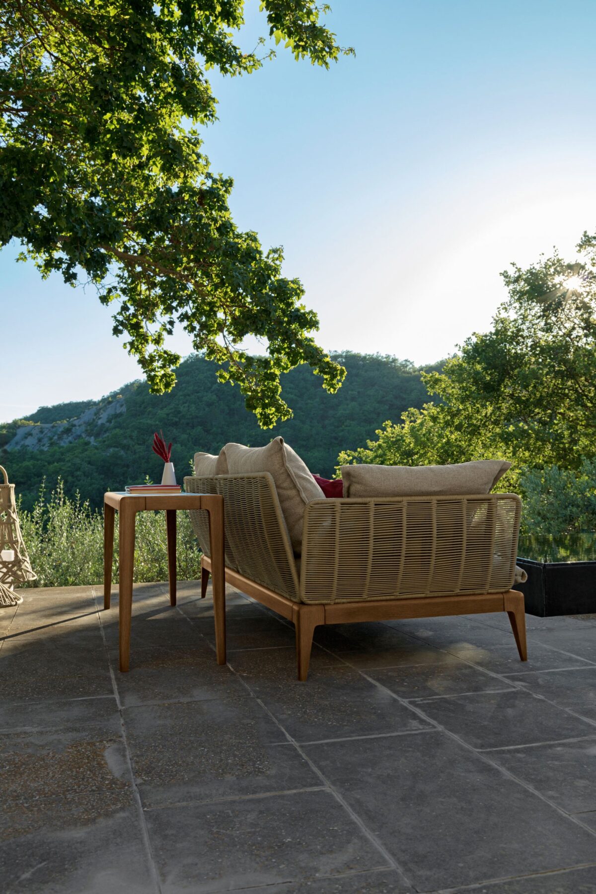 Talenti Cruise Teak Dining Chair with durable wooden frame and artisan rope texture for outdoor elegance