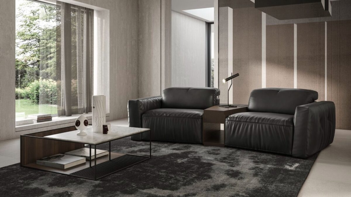 Colosseo floor lamp by Natuzzi Italia in glossy black chrome finish, featuring a 14mm diameter tubular metal frame with adjustable-angle telescopic lighting device, displayed in Royal Oak, Michigan.