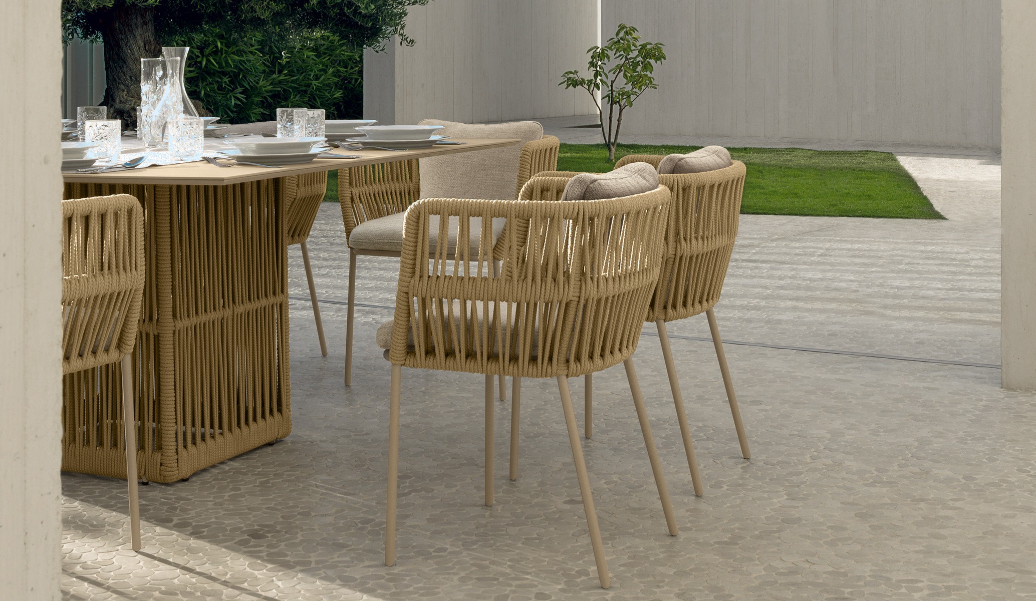 Cliff Dining Armchair by Talenti – elegant outdoor chair with woven rope detailing and cushioned seat