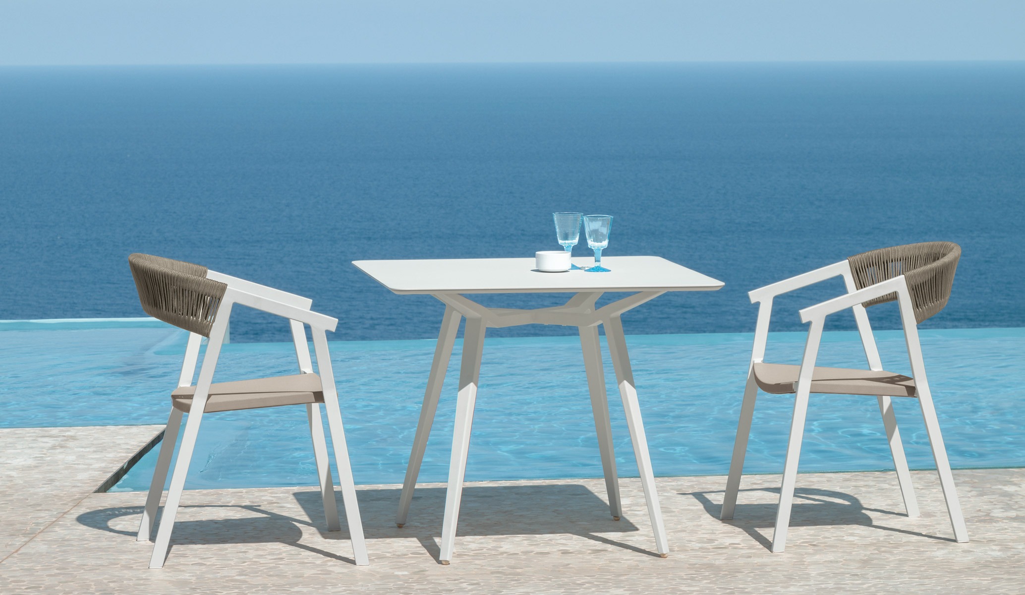 Key Dining Armchair by Talenti – contemporary outdoor armchair with woven rope details and soft cushions