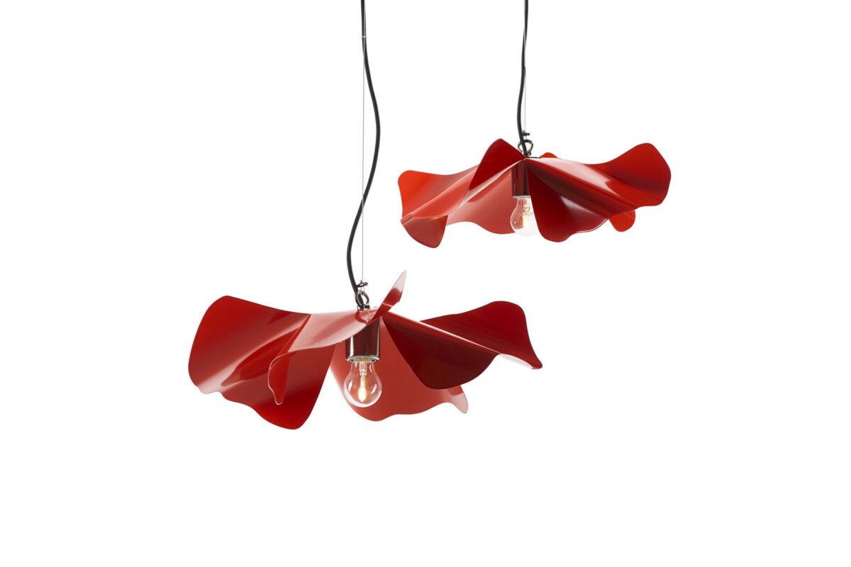 This lamp is inspired by the delicate petals of a poppy flower and is crafted from hand-folded stainless steel or brass, available in various finishes including red, white, and gold.
