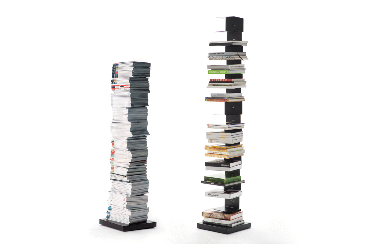 Ptolomeo Art vertical bookcase by Opinion Ciatti in matte black steel, featuring extra-large shelves for oversized books and magazines, displayed in Royal Oak, Michigan showroom.