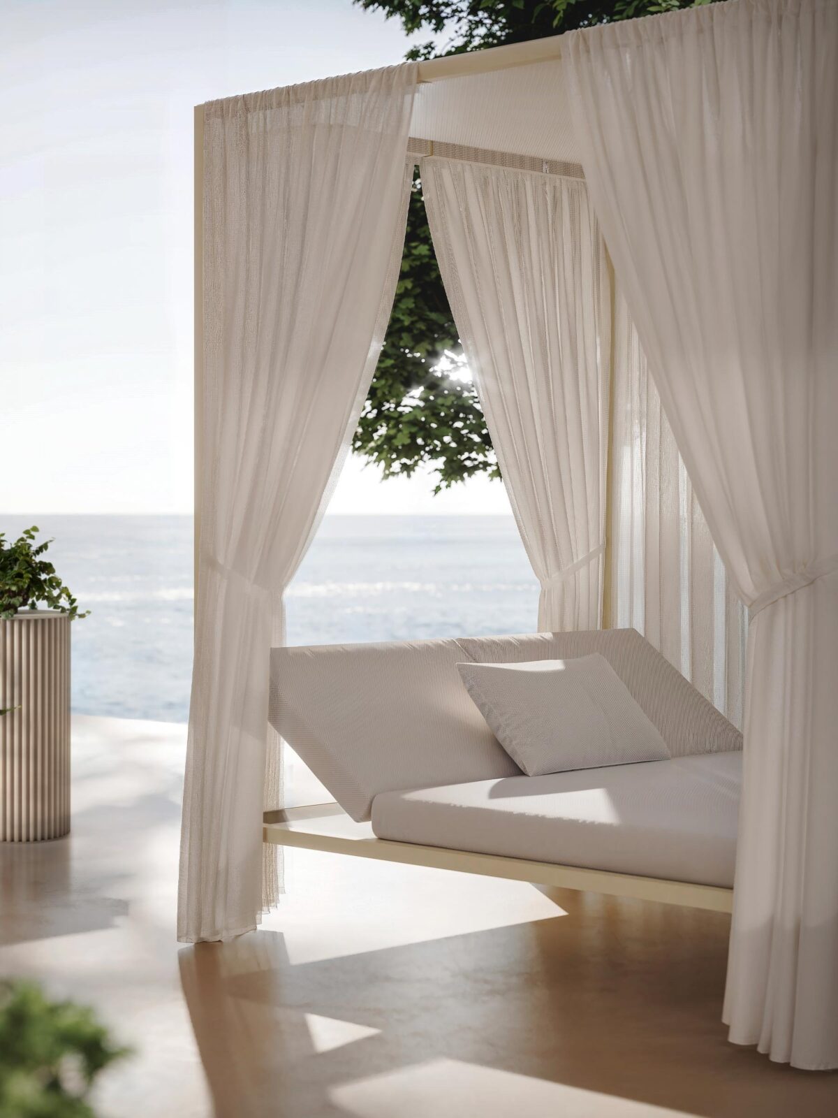 ILletto Outdoor canopy garden bed by Opinion Ciatti in beige Corkcrete finish with sheer white curtains, displayed in Royal Oak, Michigan.