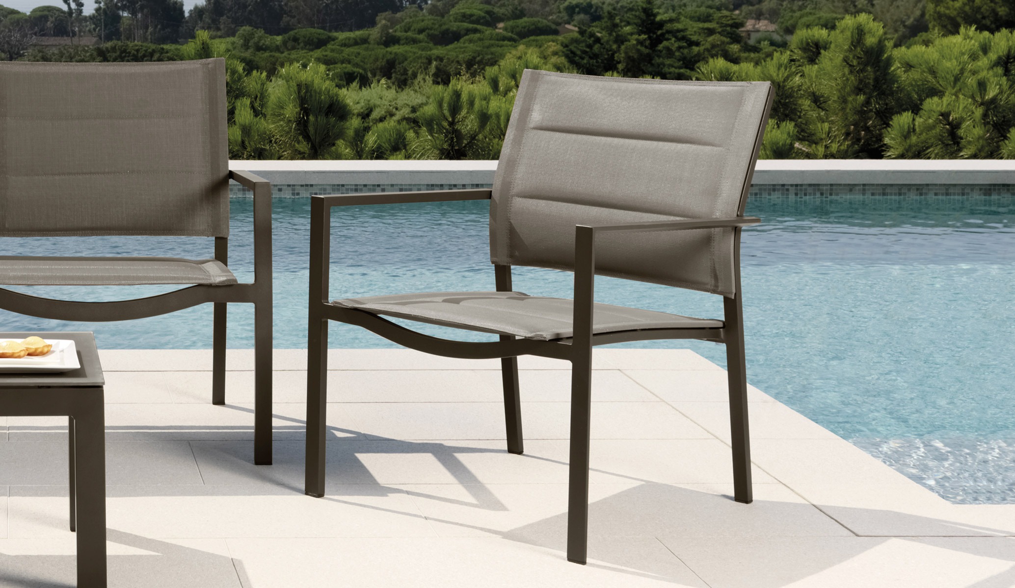 Touch Living Armchair by Talenti with deep cushions and contemporary design for modern outdoor living