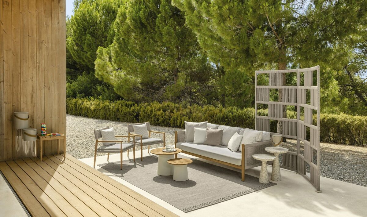 "Coral Armchair by TalentiSpa showcasing a fusion of Italian design and natural materials."