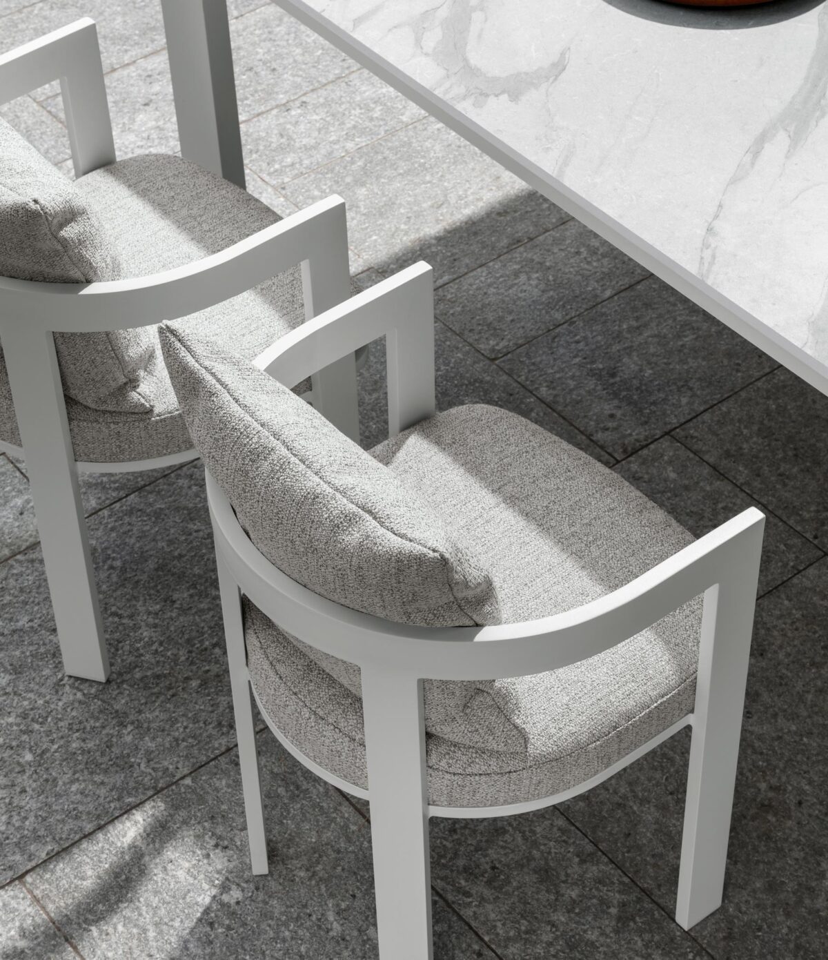 Designer Argo Alu Dining Armchair from Talenti, ideal for elegant outdoor dining settings and hospitality venues