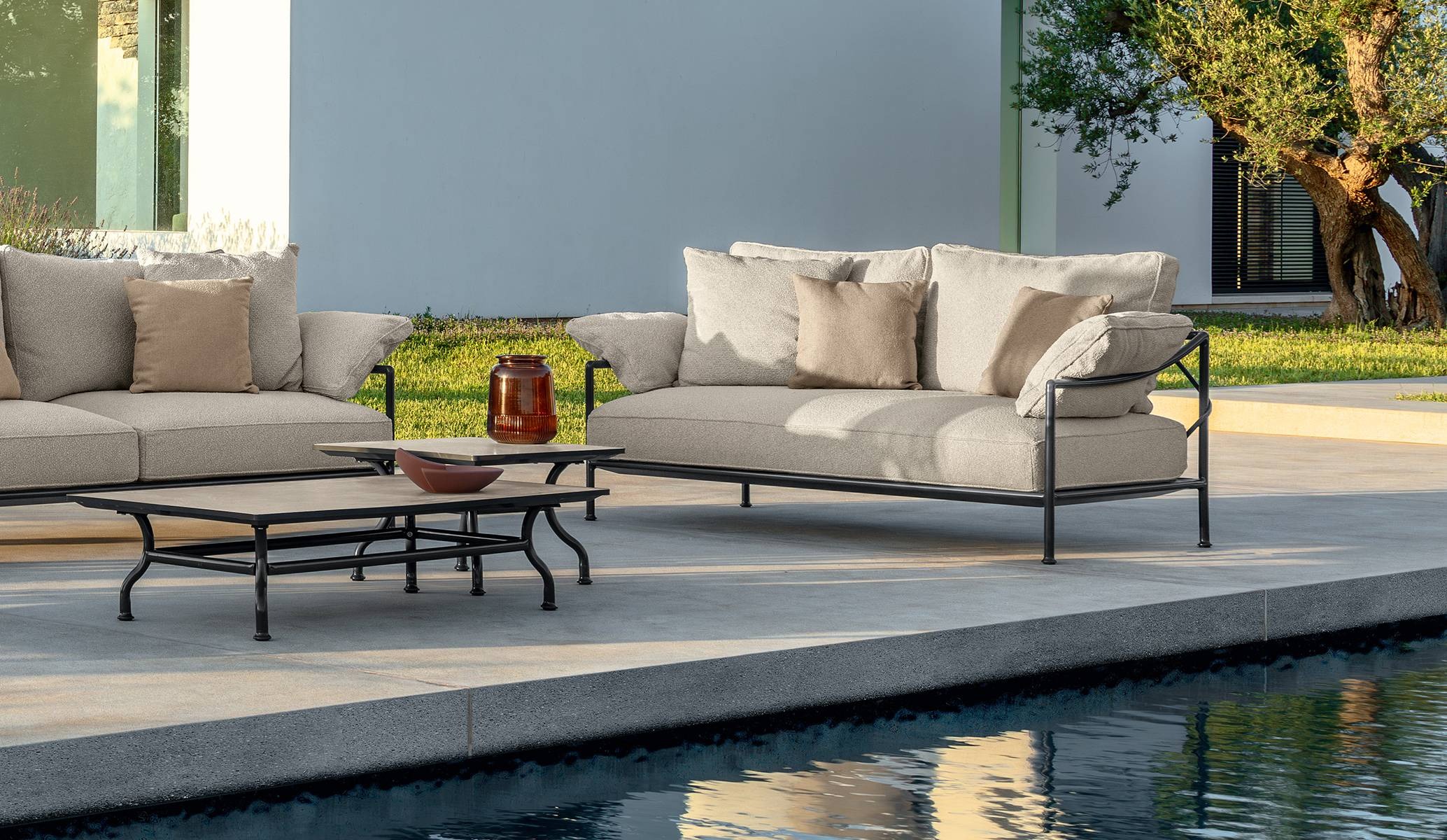 Capri Sofa 2 Seater by Talenti, designed by Ludovica and Roberto Palomba, featuring a sleek aluminum frame and neutral fabric cushions.