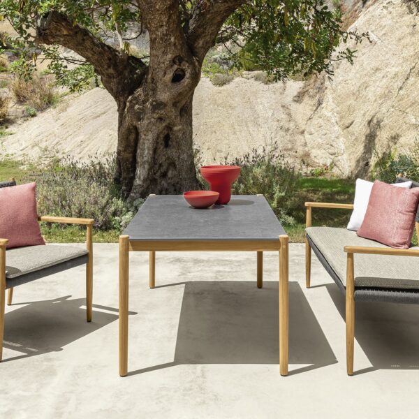 Dolcevita Love Seat by Talenti in natural teak with elegant beige cushions