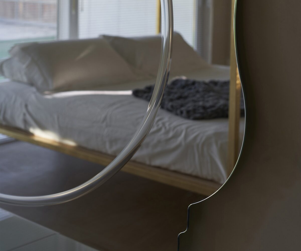 Bring refined elegance to your Birmingham, Michigan space with the Regio Mirror by Opinion Ciatti, featuring a shape-cut mirror with detailed engraving, perfect for sophisticated settings.