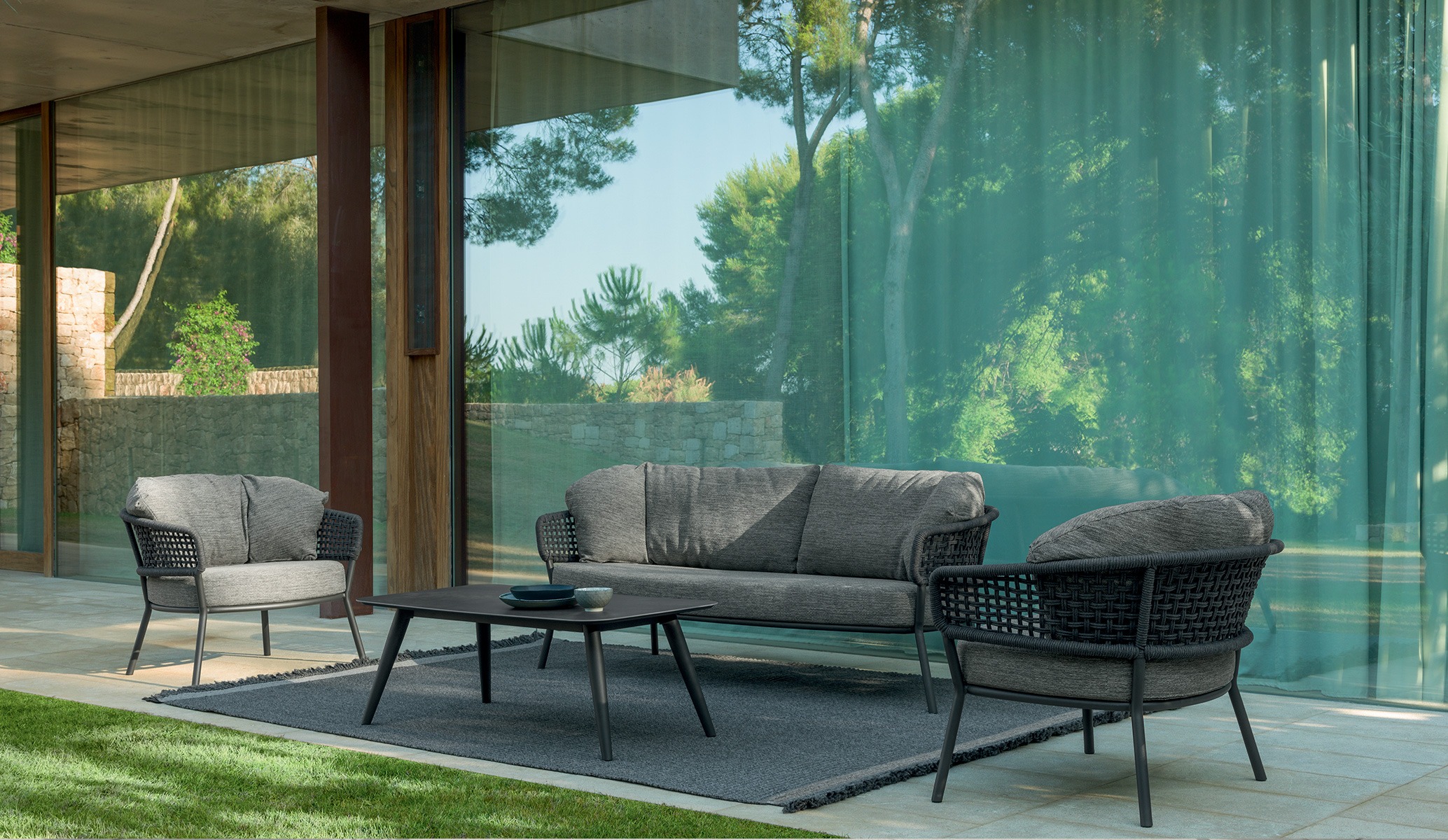 Moon//Alu Two-seater Sofa by Talenti, featuring a durable aluminum frame with elegant synthetic rope weaving for a modern outdoor design.