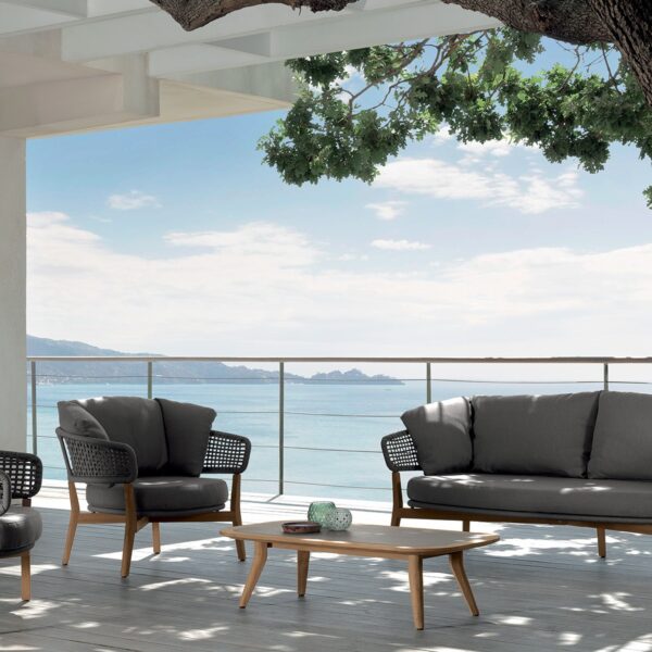 Moon//Teak Two-seater Sofa by Talenti, featuring a natural teak wood frame with intricate rope detailing for a modern outdoor look.