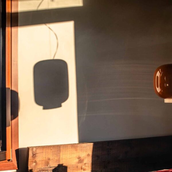 Chouchin 1 by Foscarini, orange lacquered blown glass pendant lamp with white collar, designed by Ionna Vautrin.