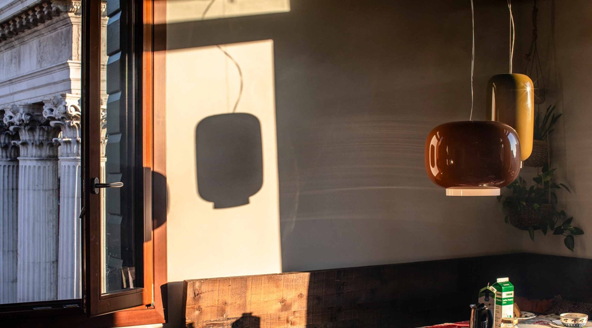 Chouchin 1 by Foscarini, orange lacquered blown glass pendant lamp with white collar, designed by Ionna Vautrin.