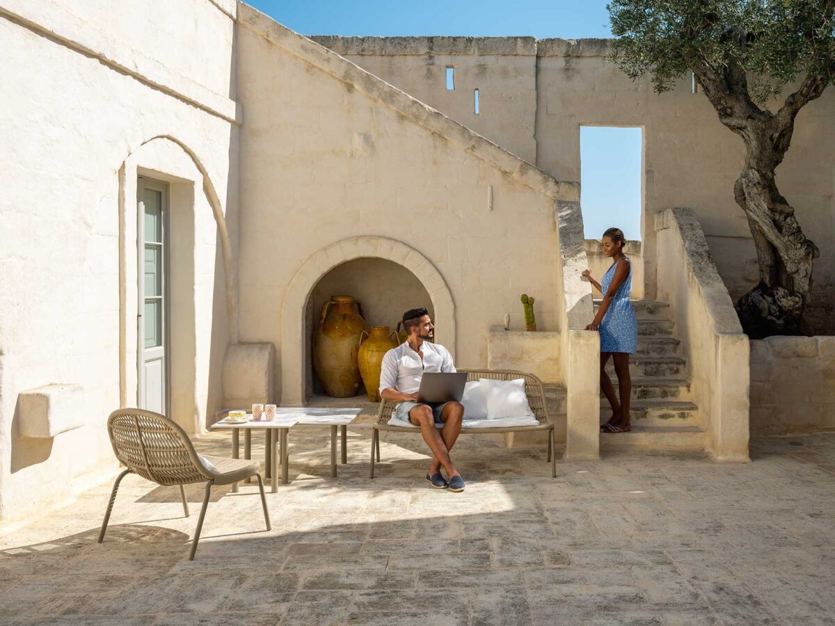 Contemporary Talenti Panama Egg Chair with rope weave and cushioned seat, styled for Troy, Michigan terraces