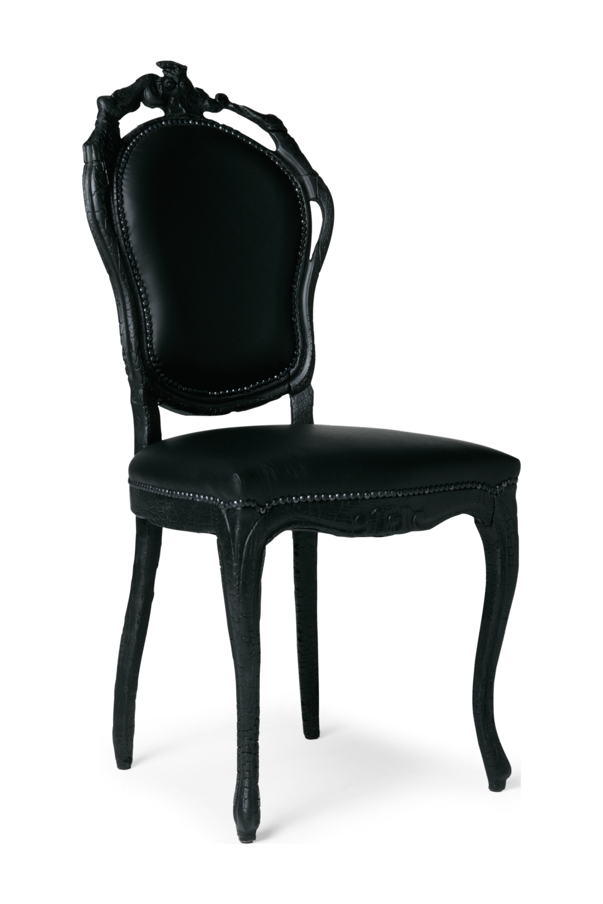Smoke Dining Chair by Moooi, crafted from burnt wood and finished with epoxy resin for a striking visual contrast.