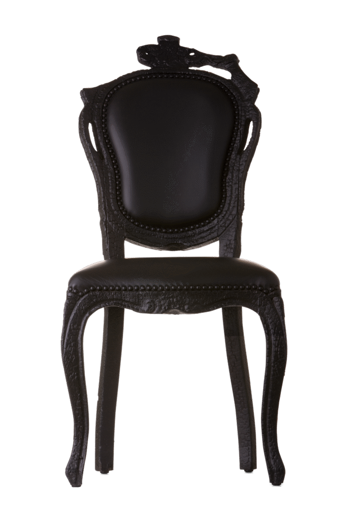 Smoke Dining Chair by Moooi, designed by Maarten Baas, featuring a burnt wood frame and epoxy resin finish.