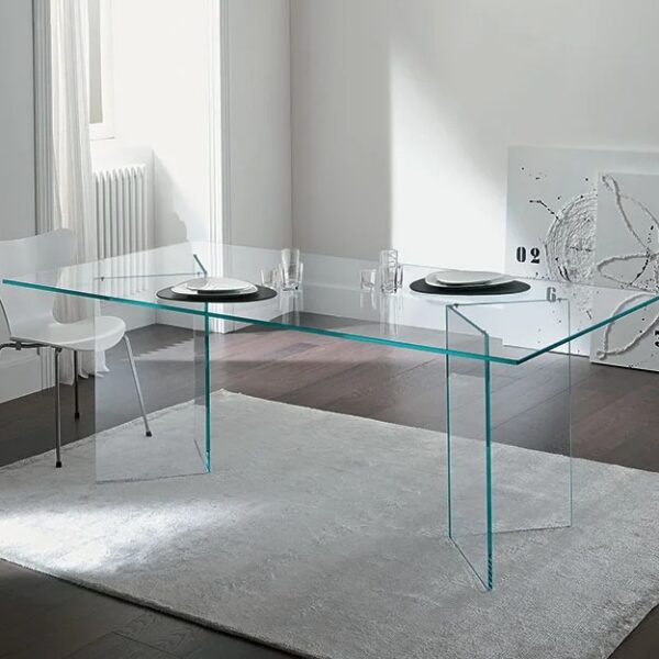 Bacco glass dining table by Tonelli Design in extra-clear finish, featuring mirrored glass supports, displayed in Royal Oak, Michigan.