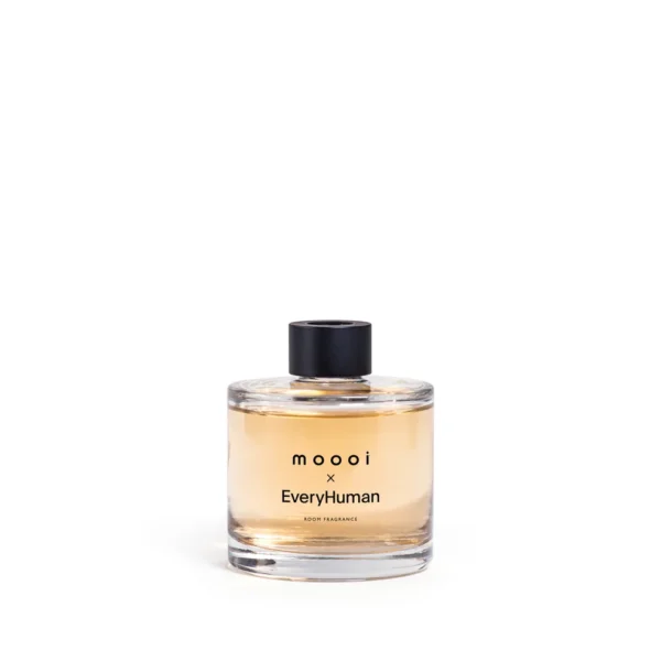 Moooi x EveryHuman Room Fragrance in a 200ml glass bottle with a black zamac cap.