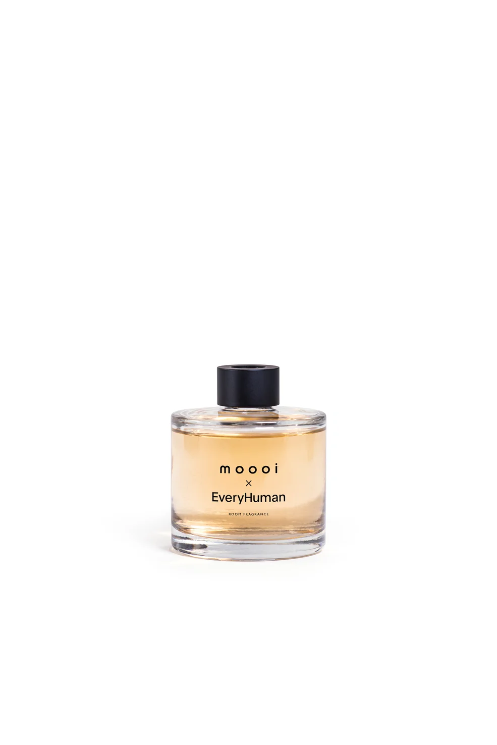 Moooi x EveryHuman Room Fragrance in a 200ml glass bottle with a black zamac cap.