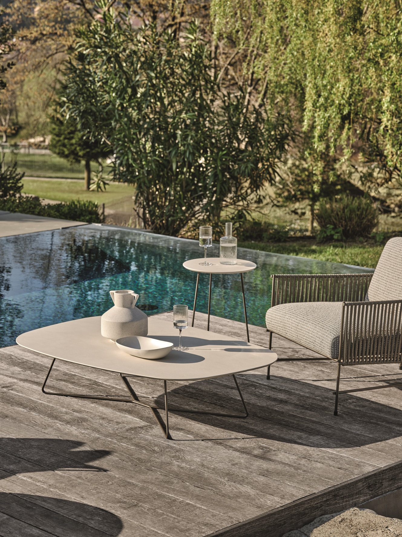 “KEVIN Outdoor coffee table by Ditre Italia – contemporary Italian patio table with minimalist design and durable materials”
