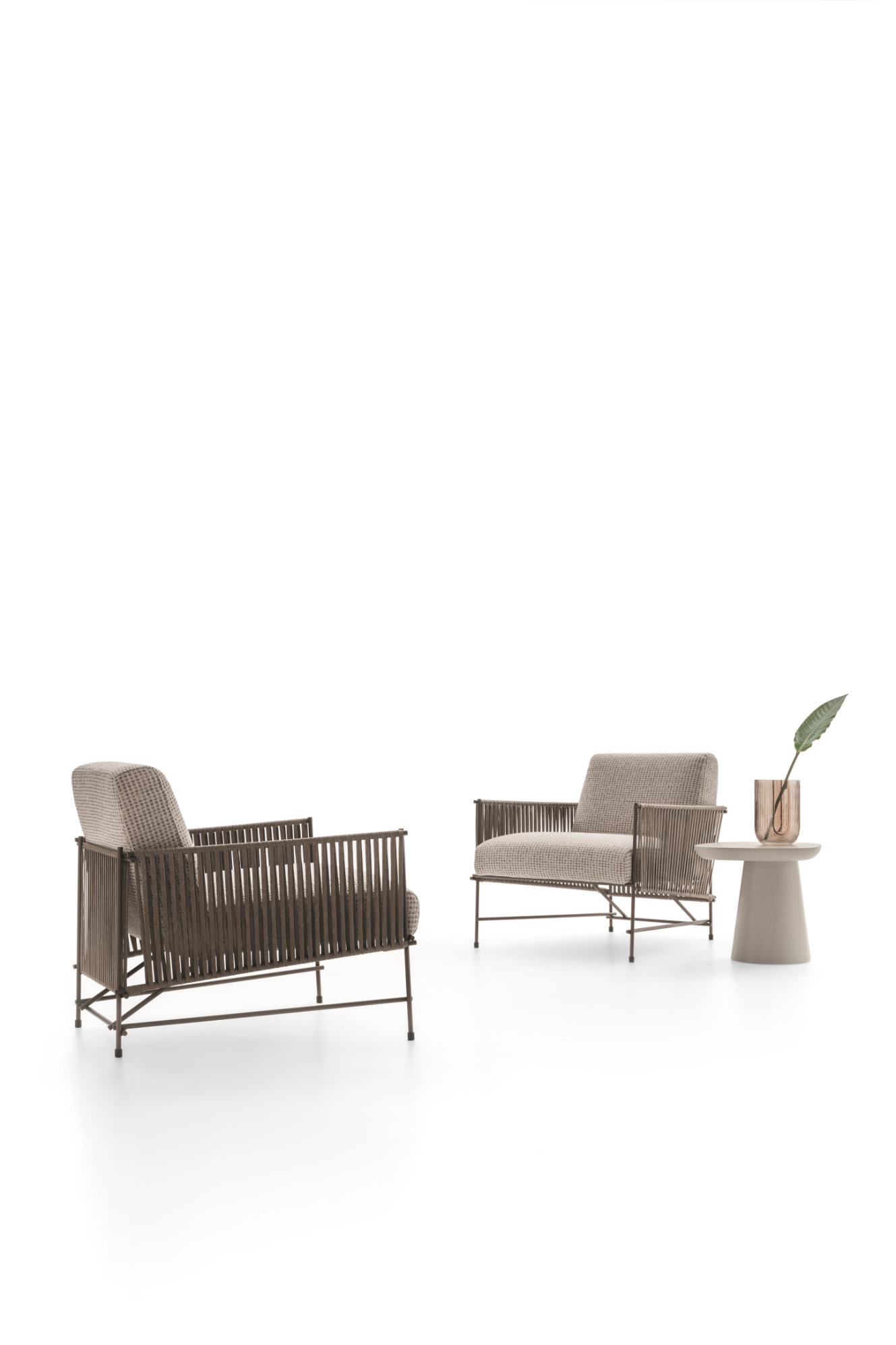 “Kyo Outdoor armchair by Ditre Italia – modern Italian lounge chair with curved structure and weather-resistant cushions”