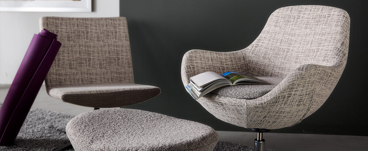 Modern Comet chair by Viaseating with clean lines and soft seating