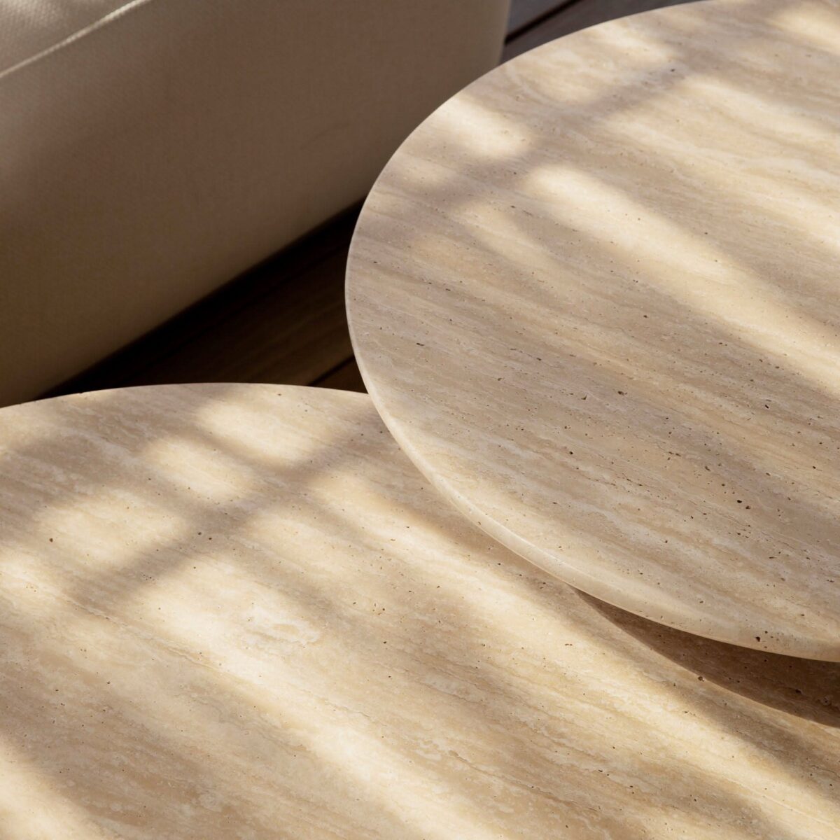 “Stylish round outdoor side table from the Maui collection – weather-resistant and architecturally inspired”