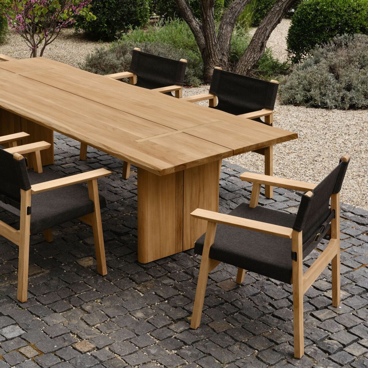 “Detail of corner joinery on MLB 106" table – seamless edge work and natural teak finish”