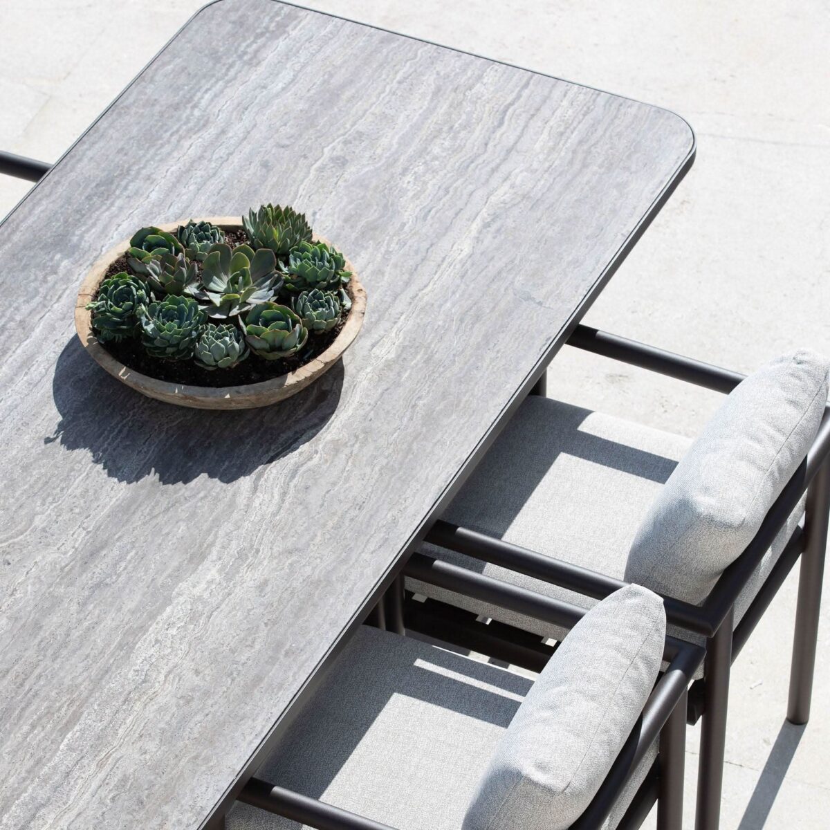  “Moab large-format outdoor dining table – blend of modern design and raw material appeal for statement dining”
