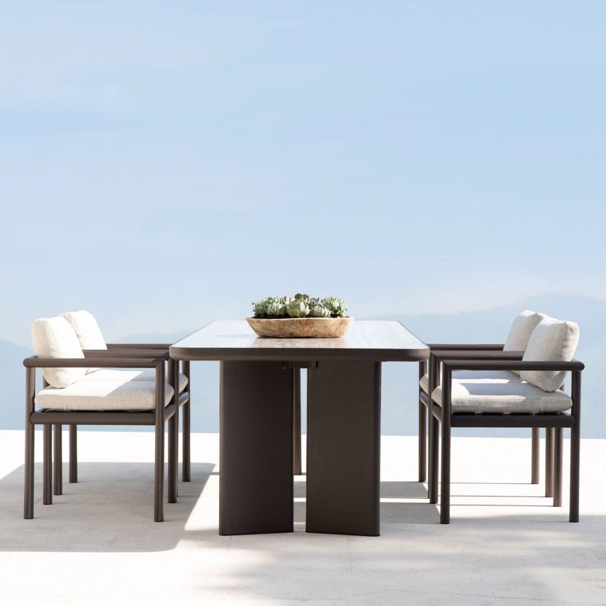 “Harbour Moab dining table styled with chairs – ideal for grand patios, dining terraces, or luxury outdoor lounges”