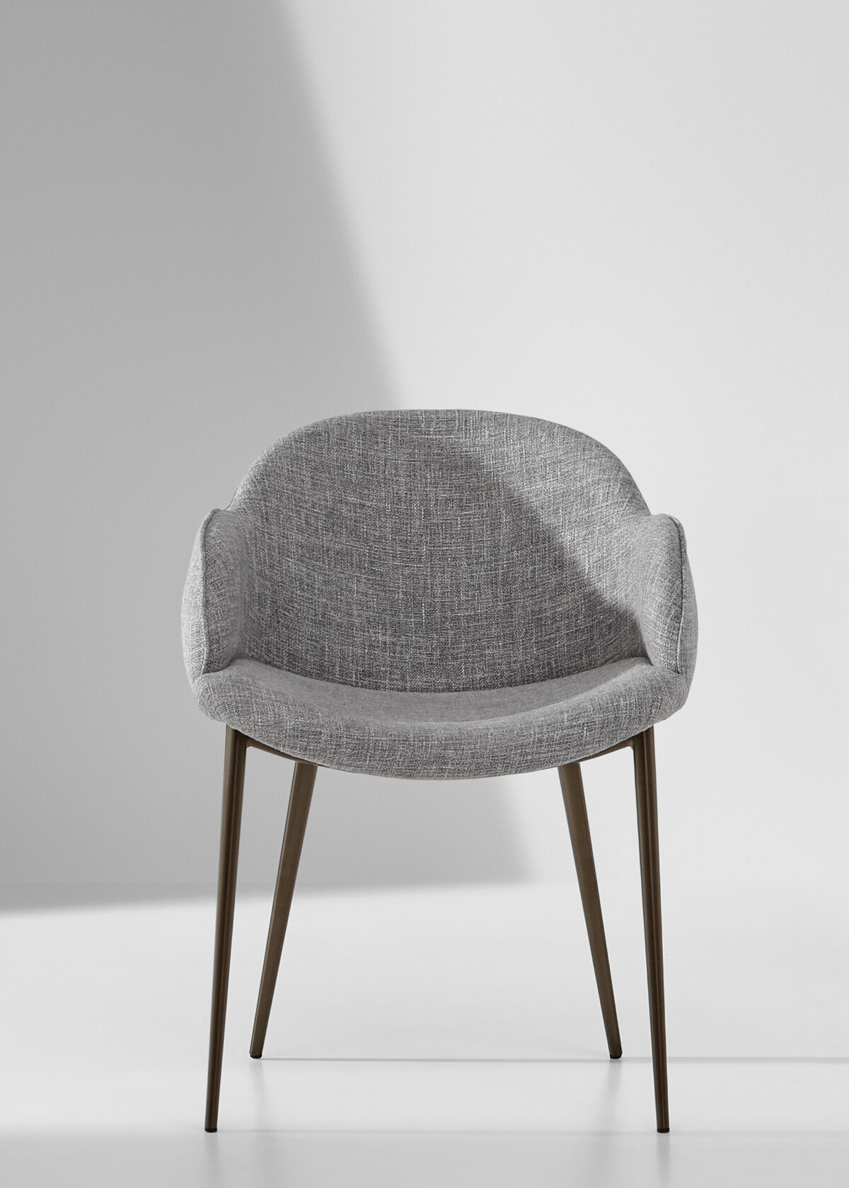“My Way Large chair by Bonaldo, wider cocooning shell backrest and cushioned seat for enhanced comfort.”