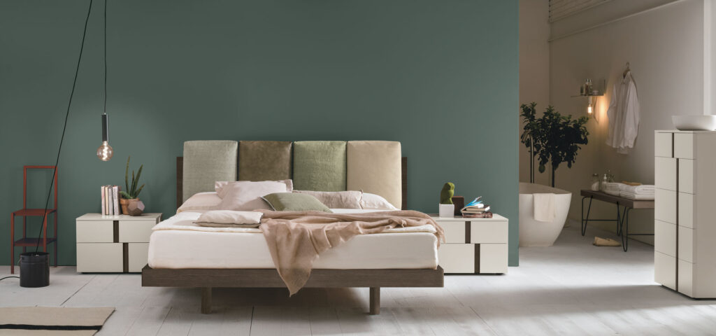 “Nikki bed by Tomasella – modern Italian bed with gently curved upholstered headboard and sleek minimalist frame”